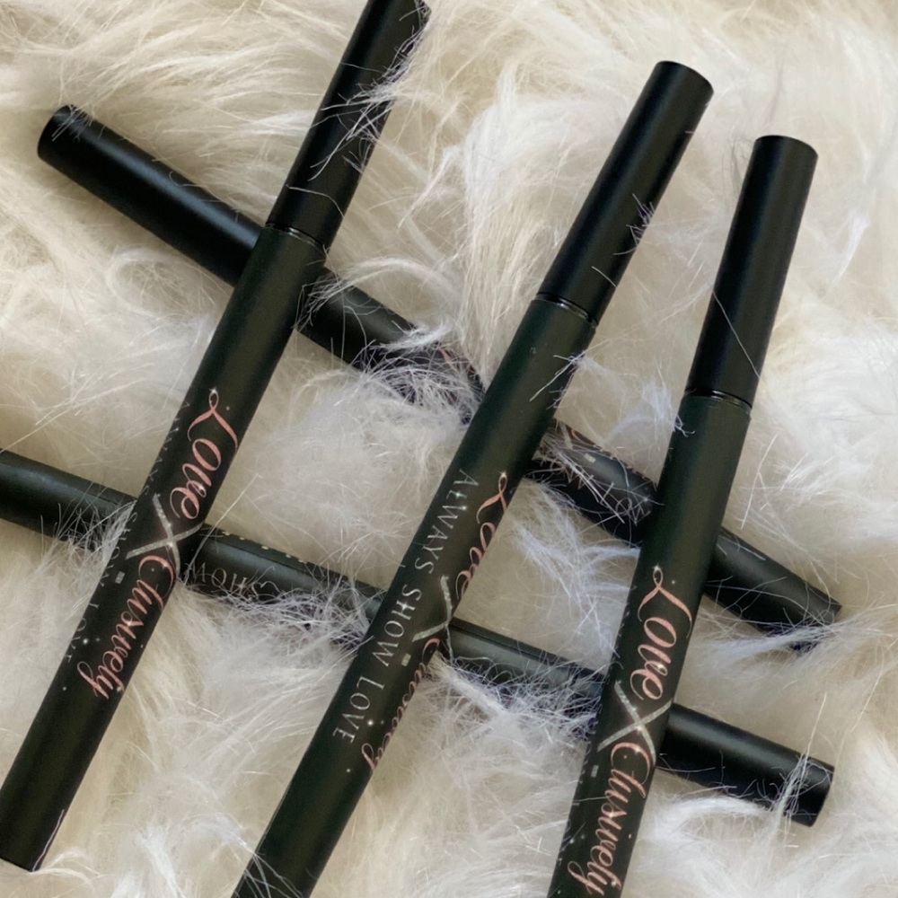 Love X. Clusively Eyeliner/Eyelash Glue Pen